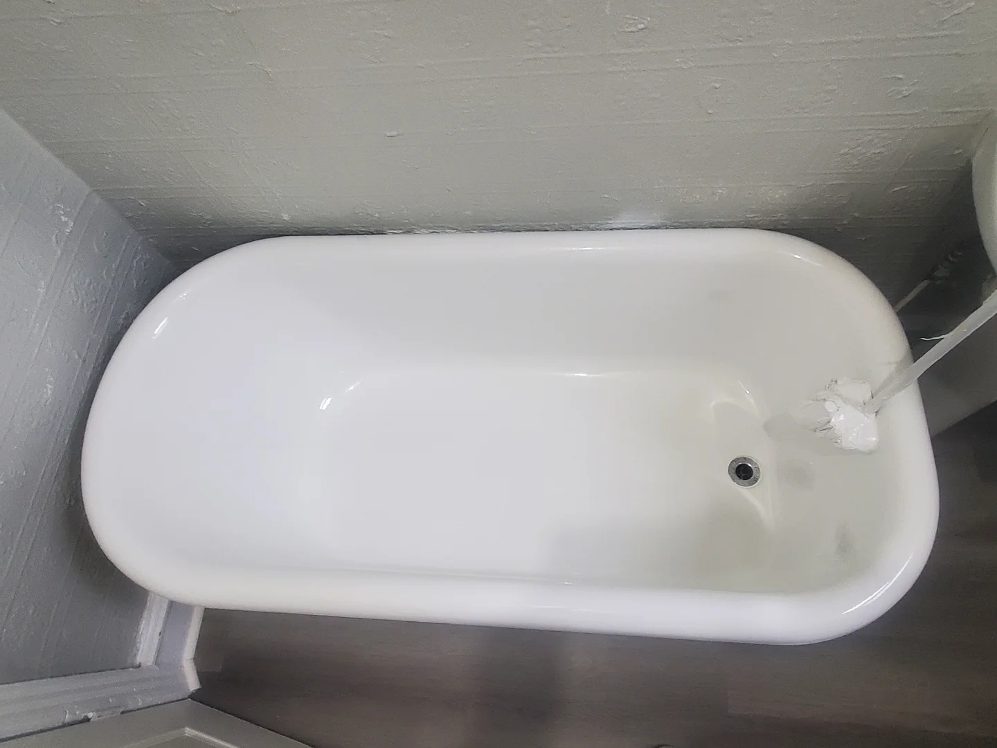 A white clawfoot bathtub from the Dab Hands project gallery