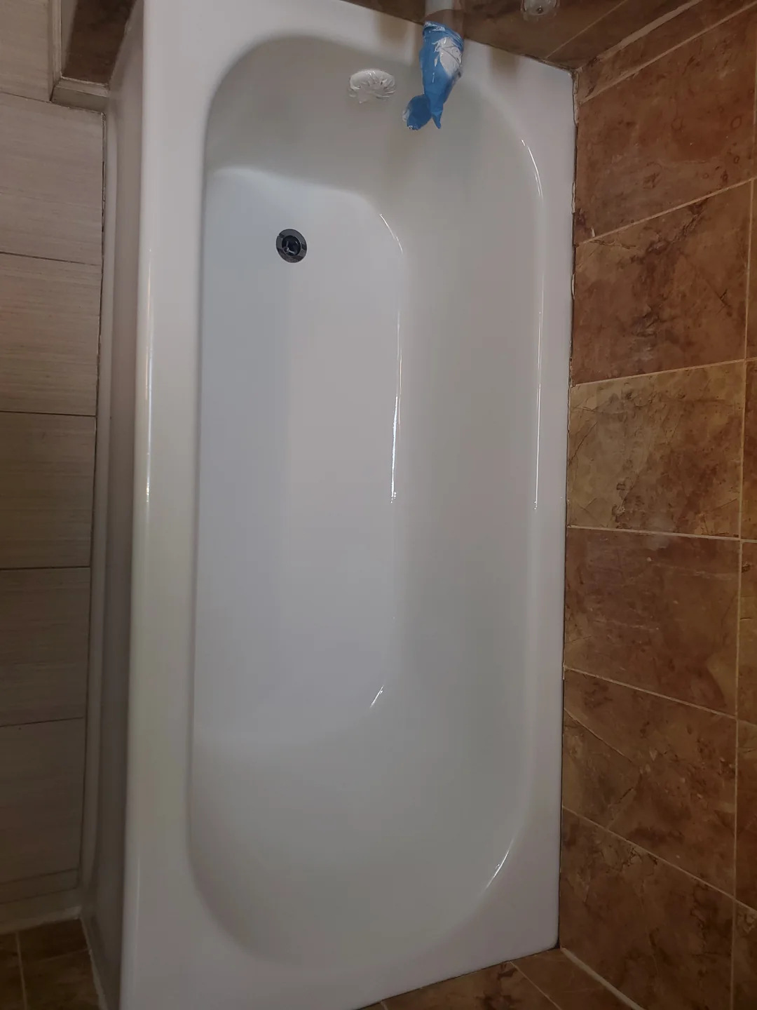 Refinished bathtub with a bright white finish